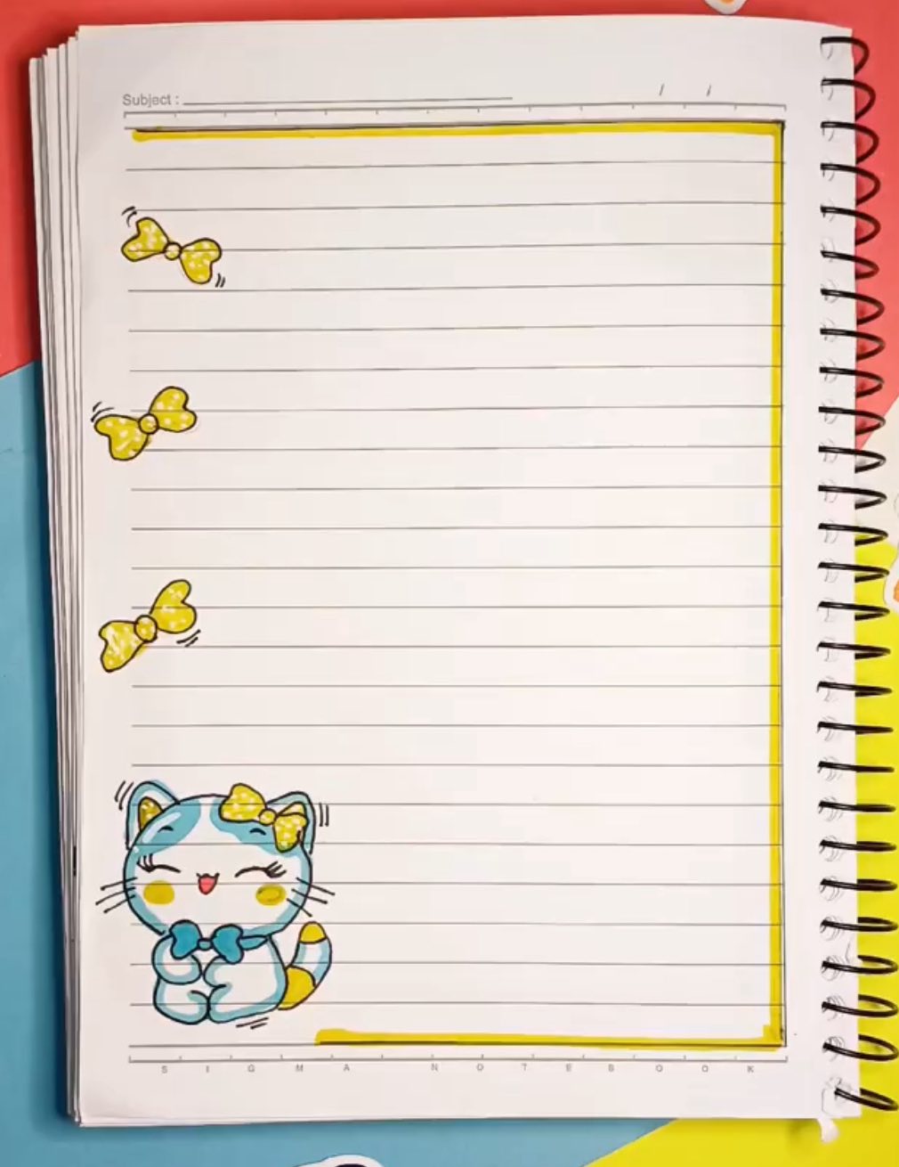 Margen de cuaderno con gatito.